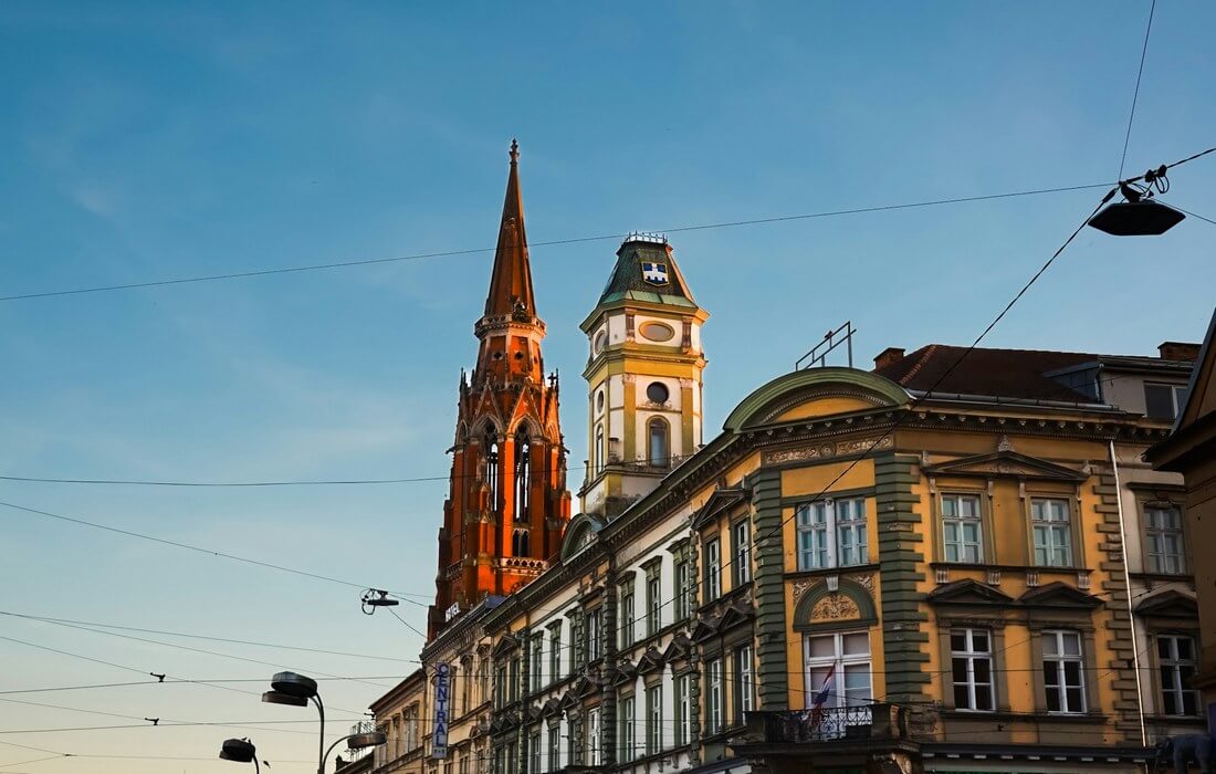 Osijek Co-cathedral towering over a city street